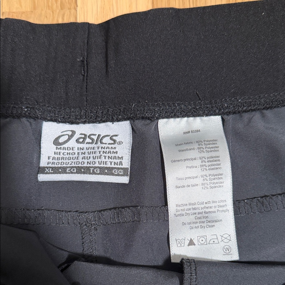 Asics Men's Dark Gray Athletic Running Shorts with Zipper Pockets - Picture 2 of 3